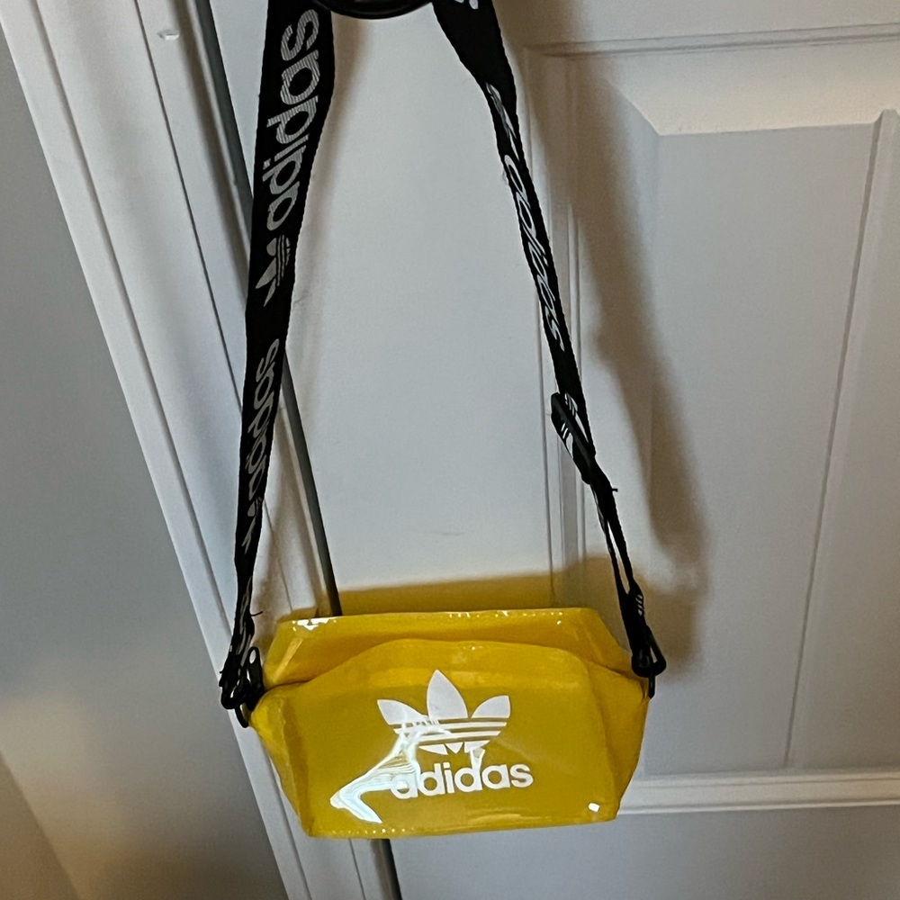 Adidas on the shoulder bag